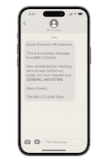 Text message appointment confirmation from Bin 2 Clean's automated online booking system